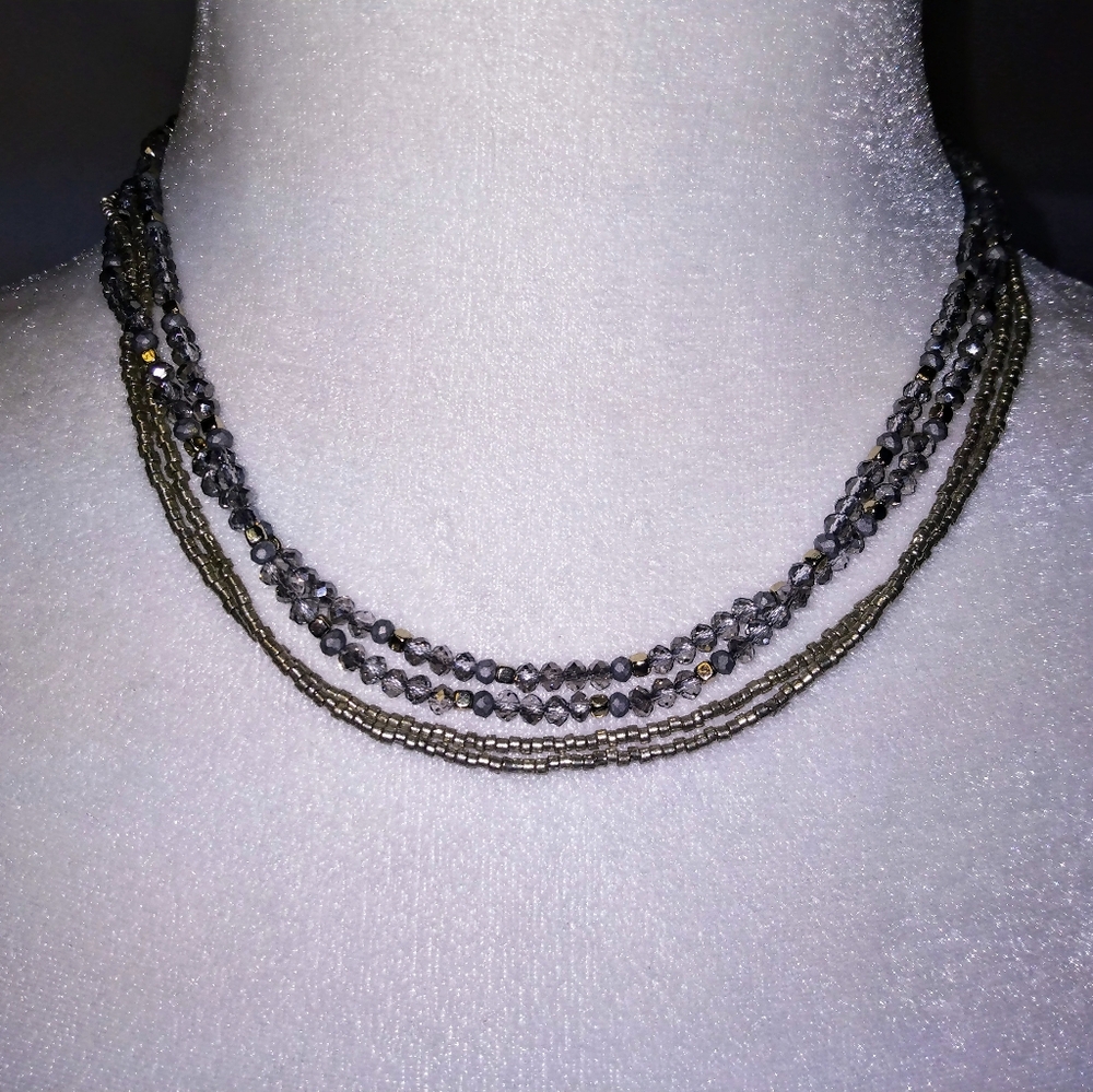 Loft outlet necklace. 4 strand. Seed beads and faceted beads. EUC.